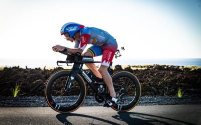 Project Podium Success – Chris Dels stands on the Ironman Podium